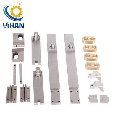 Composants en acier ferreux pour machines de pressage de bandes de cuivre